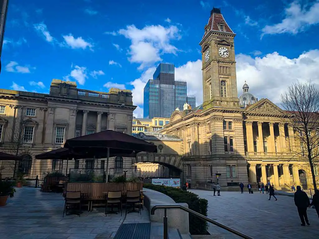 outdoor seating area at dishoom birmingham overlooking chamberlain square