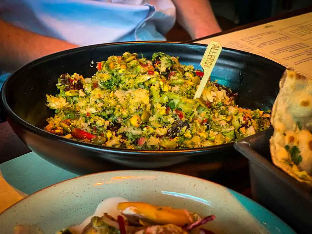 bowl of vegan food with small allergy sign in it