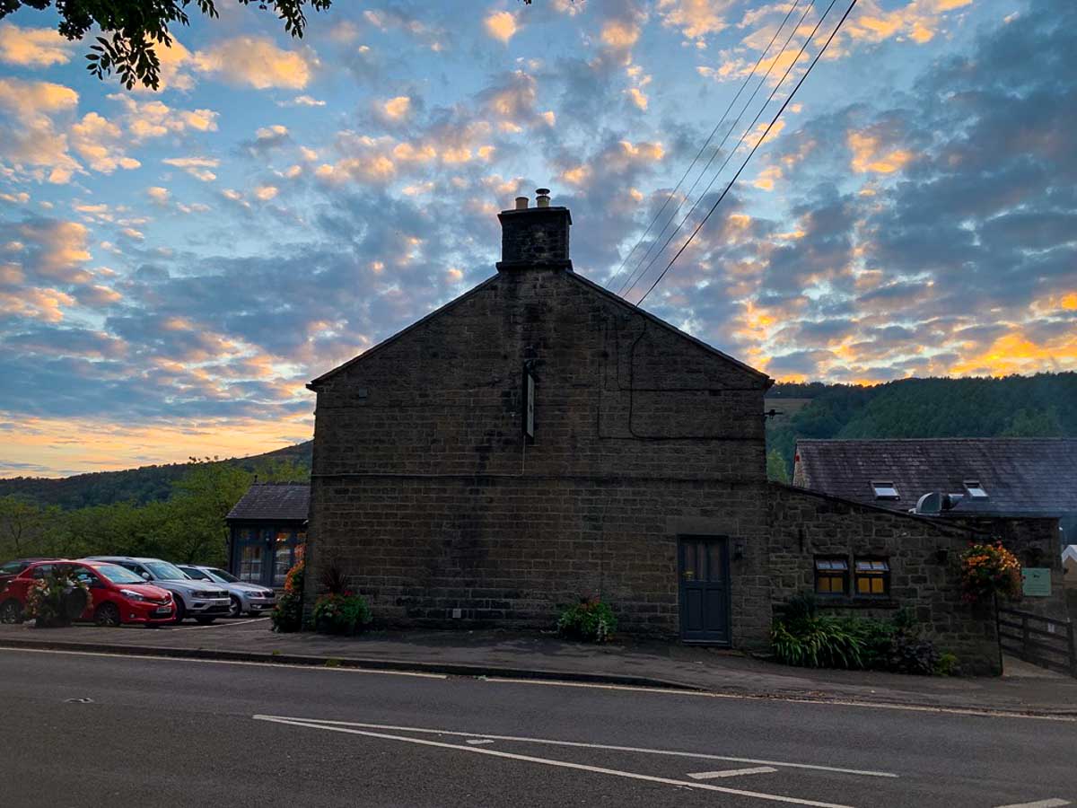 exterior of an old pub near ladybower at sunset